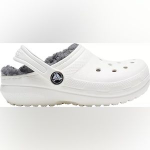Crocs kids lined classic clogs, Size 4. Like new, no visible signs of wear.